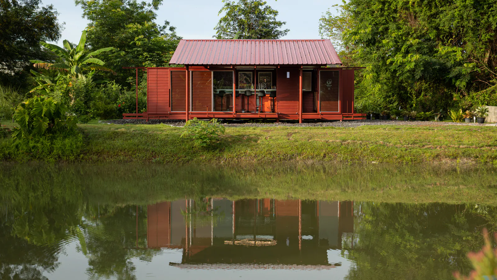 Vermilion Cafe reflected in its garden pond